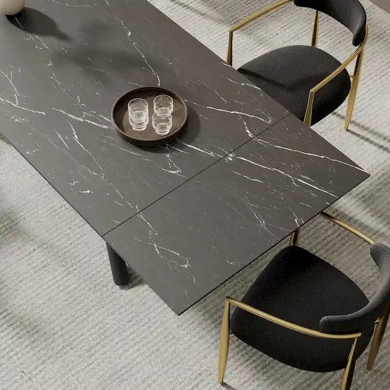 Ensemble de salle à manger 9 pièces avec plateau en pierre frittée extensible, pieds croisés et 8 chaises en tissu